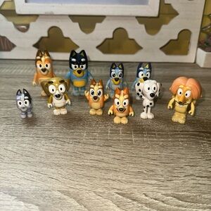 Lots Of 10 Bluey Toy Figurines well played with
